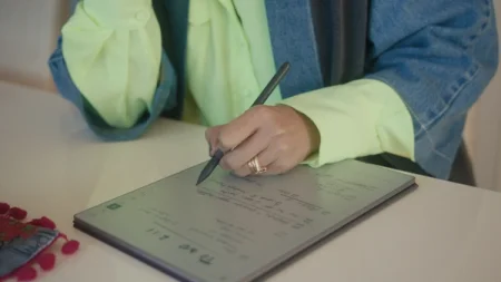 Closeup of Shruti Ganguly writing on her reMarkable Paper Pro with Marker Plus.
